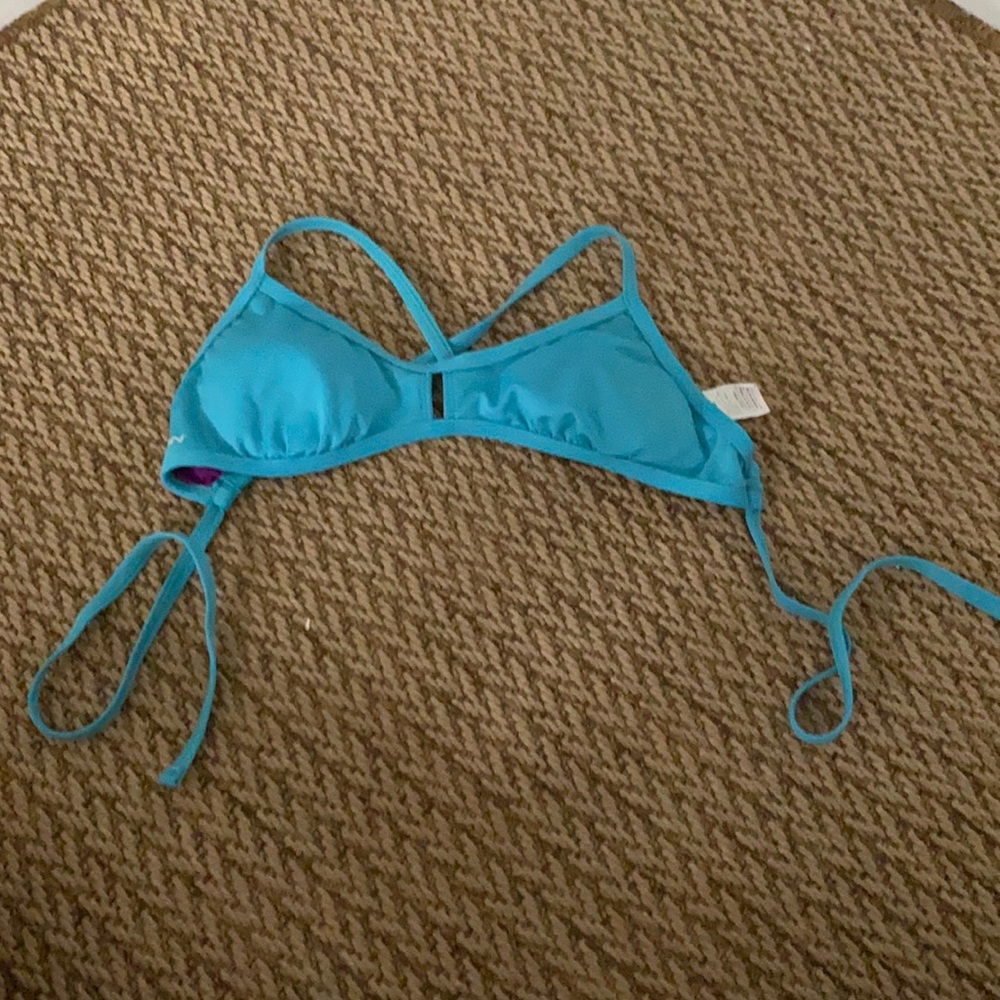Blue bikini top with cross in back